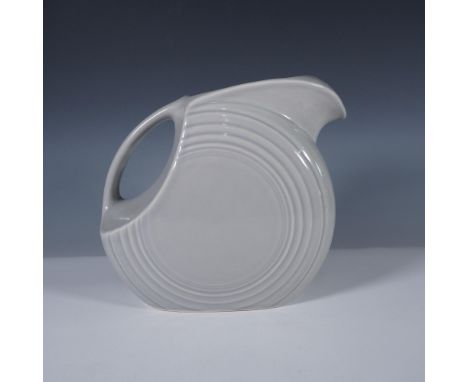Classic disc water pitcher by The Fiesta Tableware Company (formerly Homer Laughlin), in glossy gray glaze. Features the icon