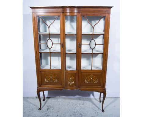 Edwardian inlaid mahogany china cabinet, with a bow-front centre section, flanked by multi-panel glazed doors, over painted p