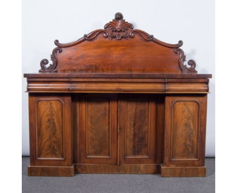 Victorian mahogany chiffionier, raised back with carved acanthus scrolls, the base with a rectangular top, three ogee moulded