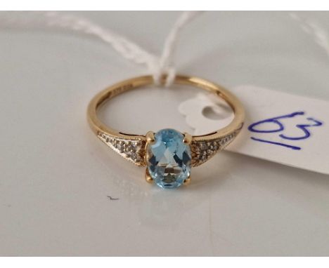A aquamarine and diamond ring 9ct size O