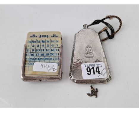 A silver mounted calender 1919 and a plated compact / coin holder