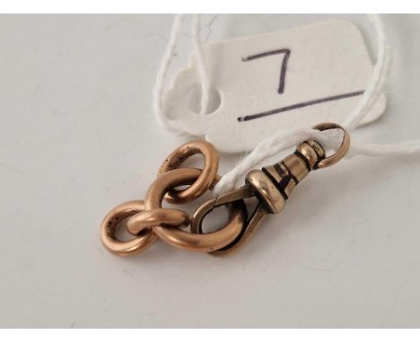 A 9ct dog clip and 9ct ring 3 gms