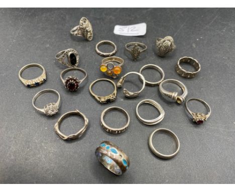 Twenty vintage silver rings