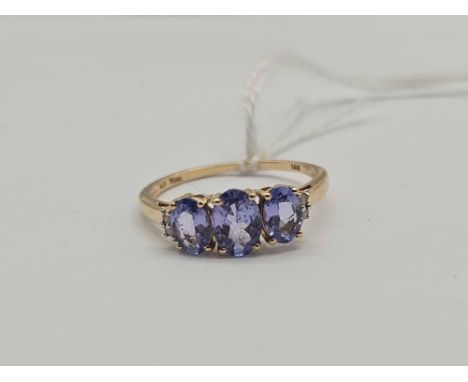 A three stone tanzanite ring with diamond shoulders 10ct gold size S 1.9 gms