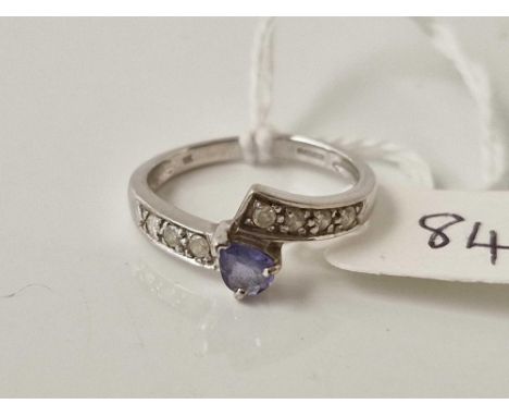 A tanzanite and diamond ring 9ct size N 2.4 gms