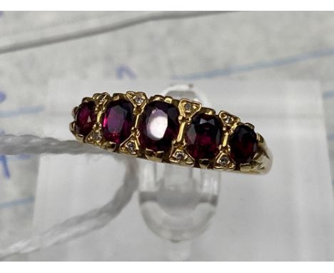 A RUBY FIVE STONE RING 18CT GOLD SIZE S 4.8 GMS