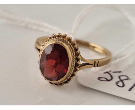 A antique single set garnet ring 9ct size O 2.4 gms