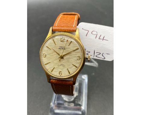 1970s Smiths Astrel 17 jewels shockproof wristwatch on brown leather strap, sweep second hand with arrow end, working