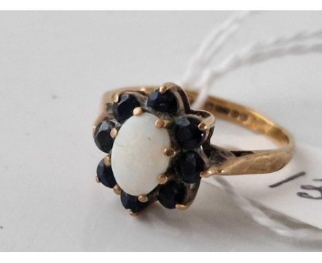 A opal and sapphire ring 9ct size L 2.2 gms