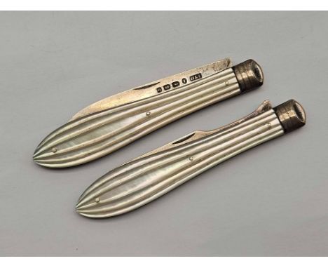 A silver bladed fruit knife and fork set with carved MOP handles Birmingham 1863 by H &amp; T