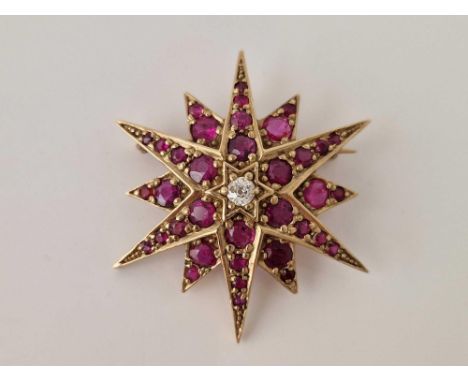 A LARGE VINTAGE RUBY AND DIAMOND STAR PENDANT BROOCH 9CT 7.6 GMS