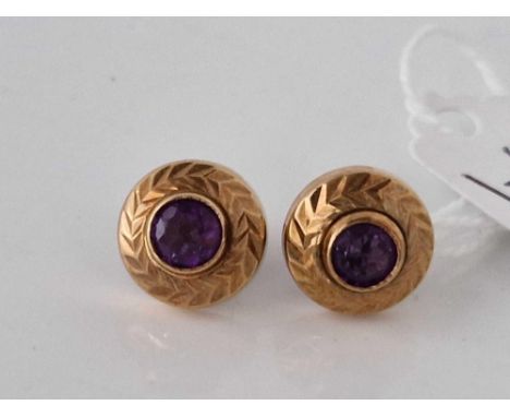 A pair of amethyst set earrings 14ct gold 3 gms