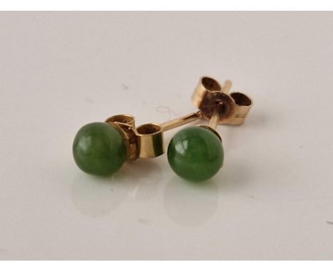 A pair of 9ct gold jade studs