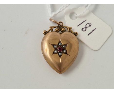 A heart locket with pearl and ruby 9ct