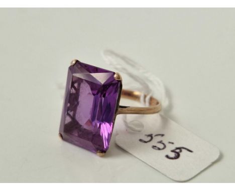 A gold and amethyst stone ring size O