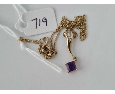 A amethyst and diamond pendant on chain 9ct 15 inch 2.8 gms