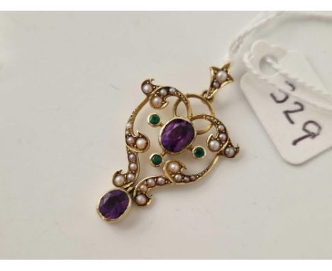 A EDWARDIAN SUFFRAGETTE GOLD PENDANT SET WITH HALF PEARLS AMETHYST AND EMERALDS 15CT GOLD  