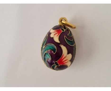 A vintage enamel egg pendant
