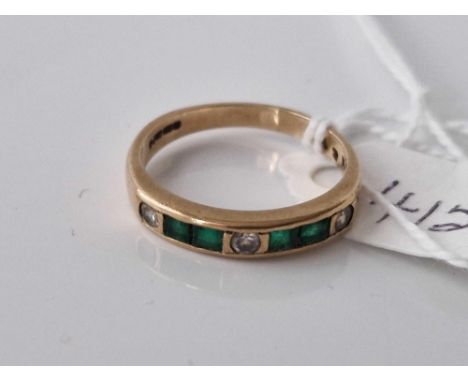 A emerald and diamond ring 9ct size O 2.4 gms