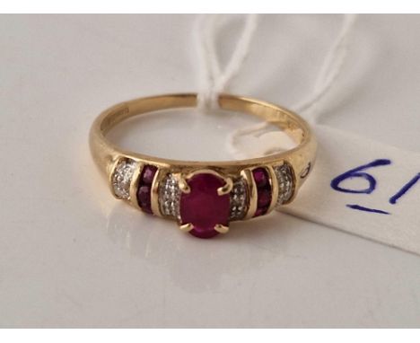 A ruby and diamond ring 9ct size P 1.9 gms