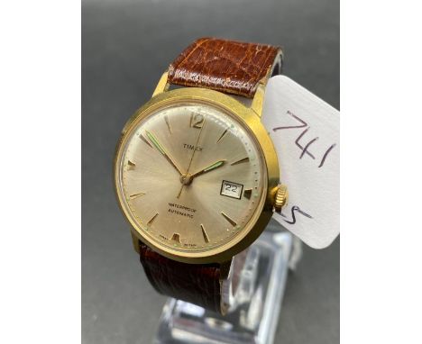 A TIMEX automatic date wrist watch with leather strap W/O