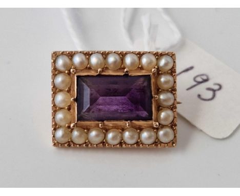 A amethyst and pearl oblong brooch 6.1 gms