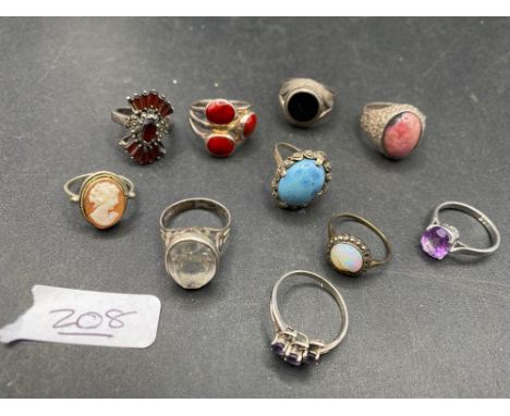 Ten assorted vintage silver rings