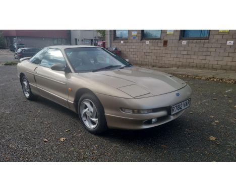 An unwanted prize, this rare, 'time-warp' Ford has covered under 1,000 miles from new. Finished in New Sahara Gold Metallic w