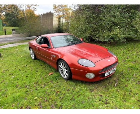 An early-production example of Aston's remarkable V12 Grand Tourer in a very rare factory colour. In 1999, the more powerful 