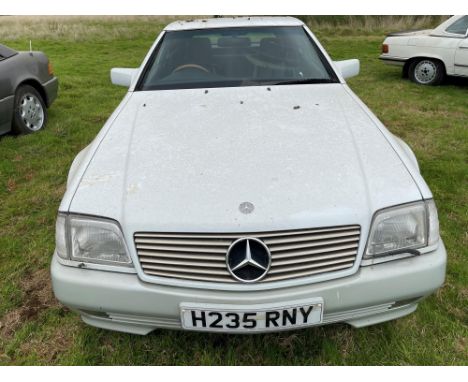 Attractive Mercedes R129 500SL-32 in Arctic White offered with No Reserve. In recent years this car has formed part of an ext
