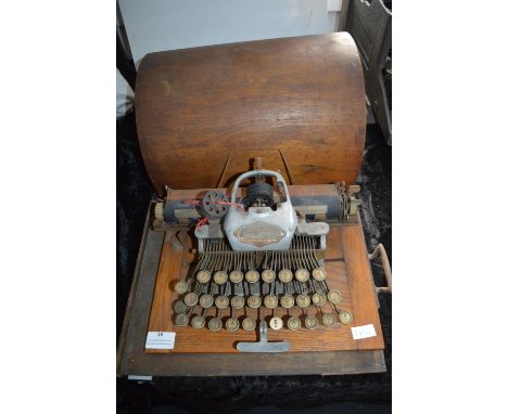 Blick Aluminium Featherweight Typewriter with Wooden Carry Case (some faults to cover)