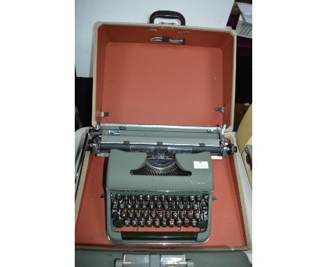 Olympia Deluxe Typewriter in Original Carry Case 