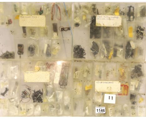 Four plastic trays with OO spares, motors, brushes and spring Hornby/Lima? P&amp;P Group 2 (£18+VAT for the first lot and £2+