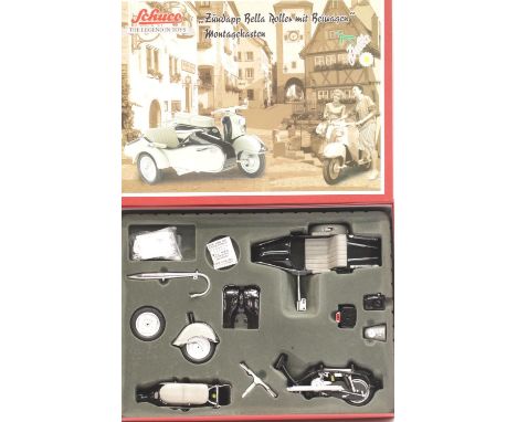 Schuco kit of Zundapp Bella scooter and sidecar, 1/12 scale complete with instructions.  P&P Group 2 (£18+VAT for the first l