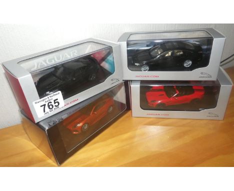 IXO 1:43 x 3 JAguars and 1 1:43 scale TSM Jaguar. P&amp;P Group 2 (£18+VAT for the first lot and £2+VAT for subsequent lots) 