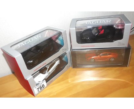 IXO 1:43 x 3 Jaguars and 1 1:43 scale TSM Jaguar. P&amp;P Group 2 (£18+VAT for the first lot and £2+VAT for subsequent lots) 