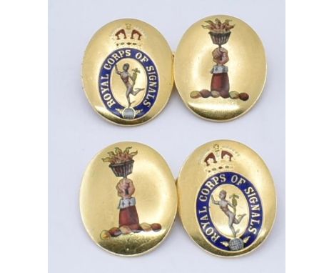 A pair of 18ct gold and enamel set Royal Signal Corps military cufflinks. The cuff links having oval panels united by chains.