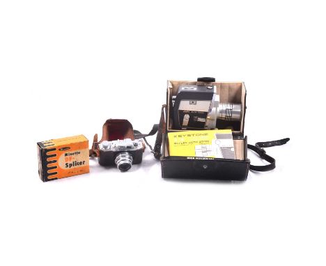 A Keystone K-12 Reflex Auto Zoom 8mm cine camera, with instruction manual, other paperwork, and leather carry case; Agfa 35mm