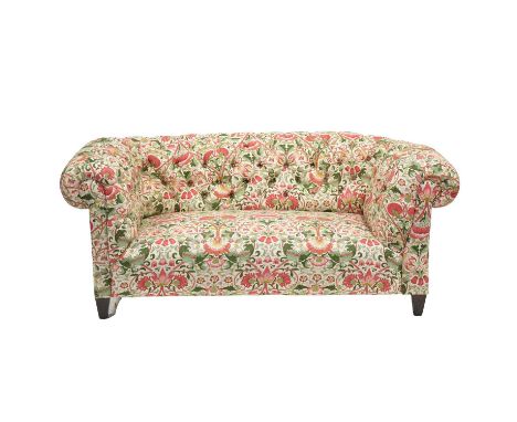 Victorian drop-end Chesterfield settee, reupholestered in a Morris &amp; Co Lodden pattern fabric, the drop end mechanism def