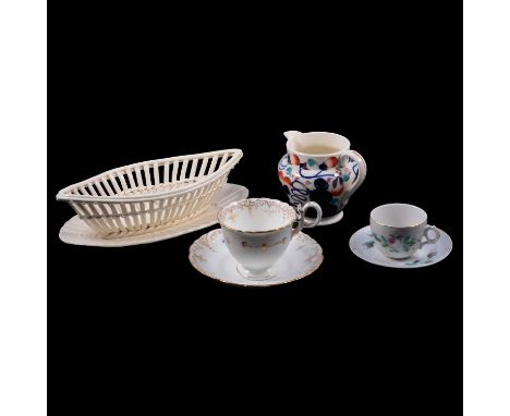 Small quantity of decorative ceramics and glass including Newhall tea bowl, two graduated Staffordshire jugs, commemorative m