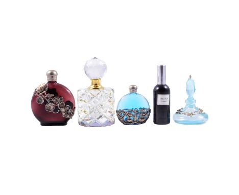A collection of vintage branded perfume bottles.