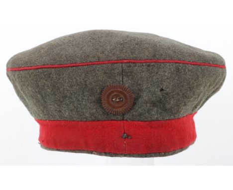 WW1 German Infantry Feldmutze (Kratzchen), good untouched example in field grey cloth with red piping to the crown and centra