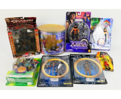 Xena - Spawn - Reboot - LOTR. A selection of Eight carded and boxed figures appearing Mint in box with VG card and Poor to Go