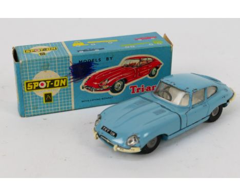 Tri-ang Spot-On - A boxed Jaguar E Type Coupe in light blue # 217. The car appears in Fair to Good condition in a Good box wi
