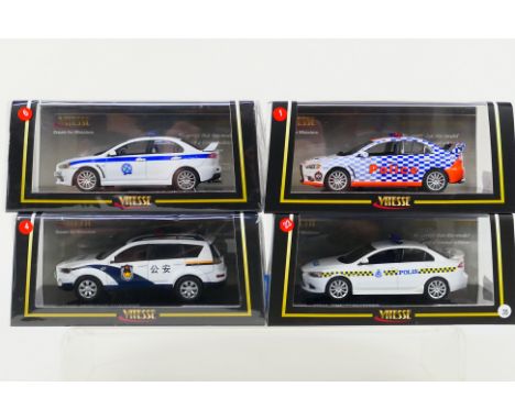 Vitesse - 4 x limited edition Mitsubishi models in 1:43 scale, a Lancer Evolution X in Greek Police livery, an Outlander in C