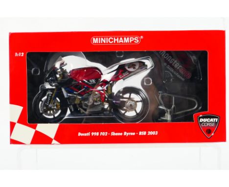 Minichamps - A boxed #122031204 1:12 scale Ducati 998 FO2 - Shane Byrne BSB 2003 Team Monstermob. The model appears Mint in a