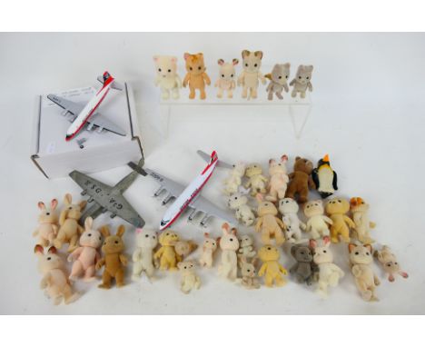 Dinky, Corgi, Hobby Master, Sylvanian Animals - 3 x unboxed die-cast and metal die-cast aircraft and in excess of 30 x Sylvan