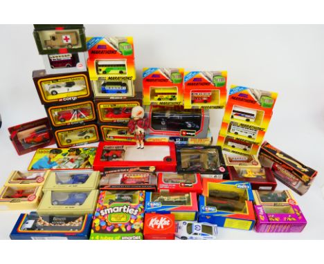 Bburago - Corgi - Lledo - Others - A mixed collection of mainly boxed diecast in various scales, including a Bburago 1;24 sca