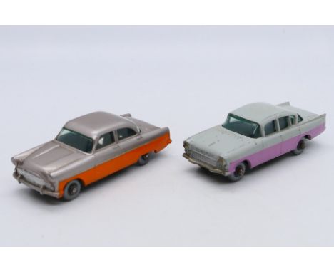 Matchbox - Two unboxed Matchbox Regular Wheel vehicles. Lot consists of Matchbox #22 Vauxhall Cresta (light grey body, pink s
