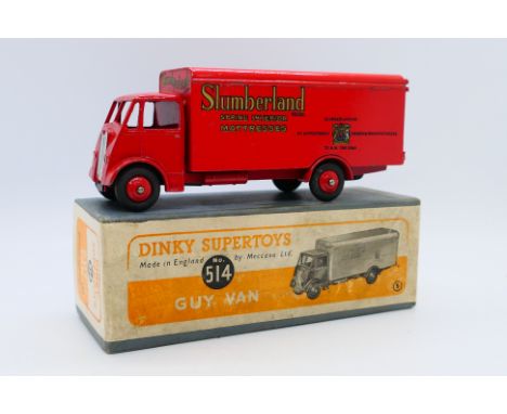 Dinky - A boxed 1950-52 Guy Van in Slumberland livery # 514. This model appears in Very Good condition with light signs of ag